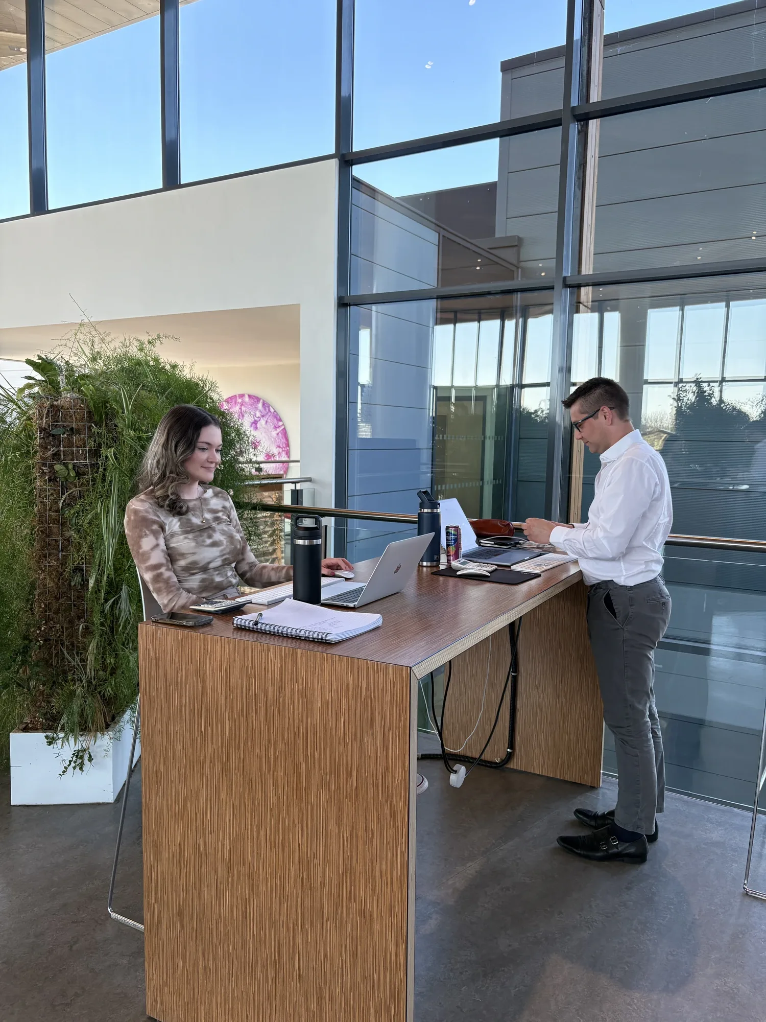 Luke and Abbie working at their office in Bristol & Bath Science Park